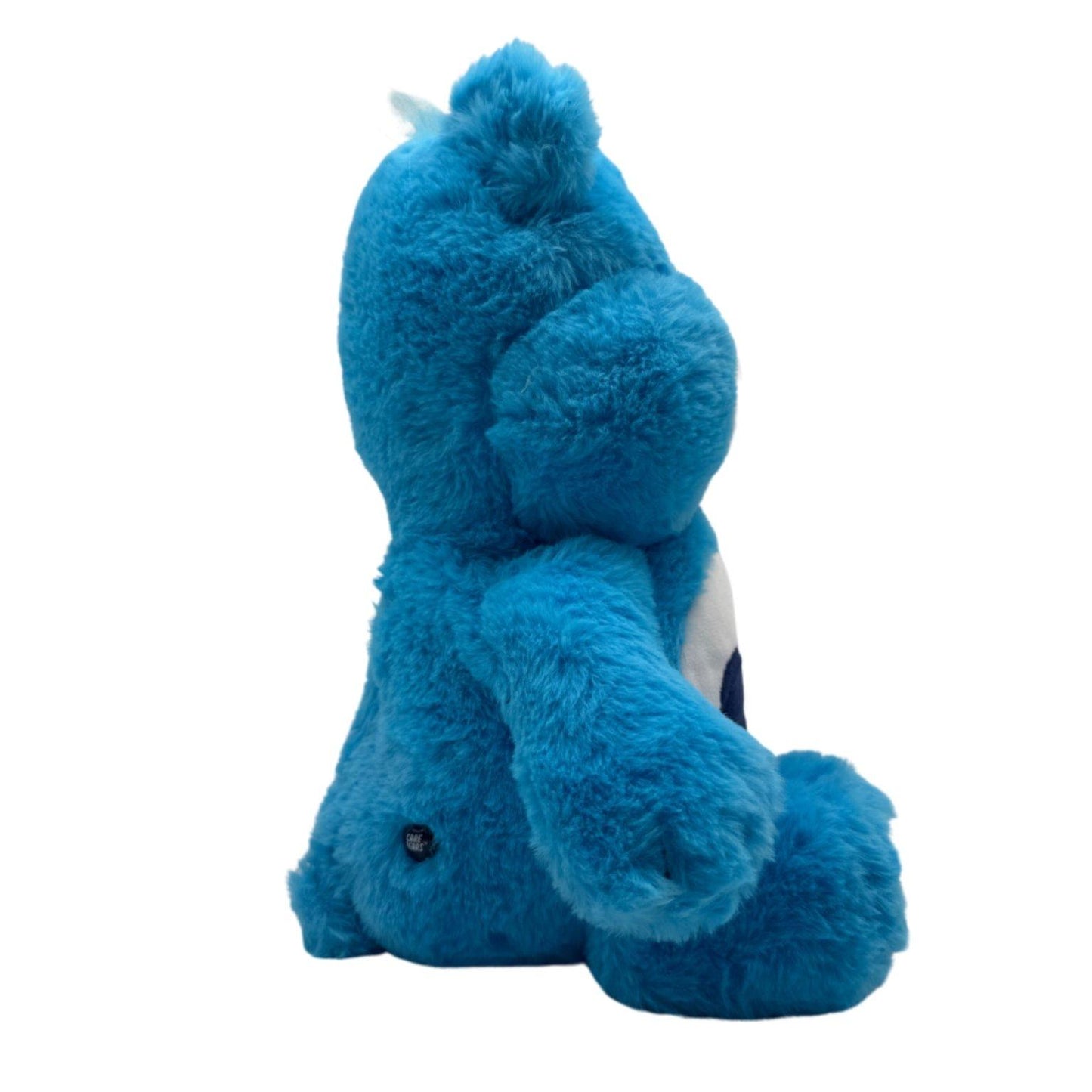 Zijaanzicht van het Brombeertje β Grumpy Bear met pluizige blauwe vacht en zachte vorm