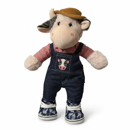 knuffelkoe met boerenoverall outfit