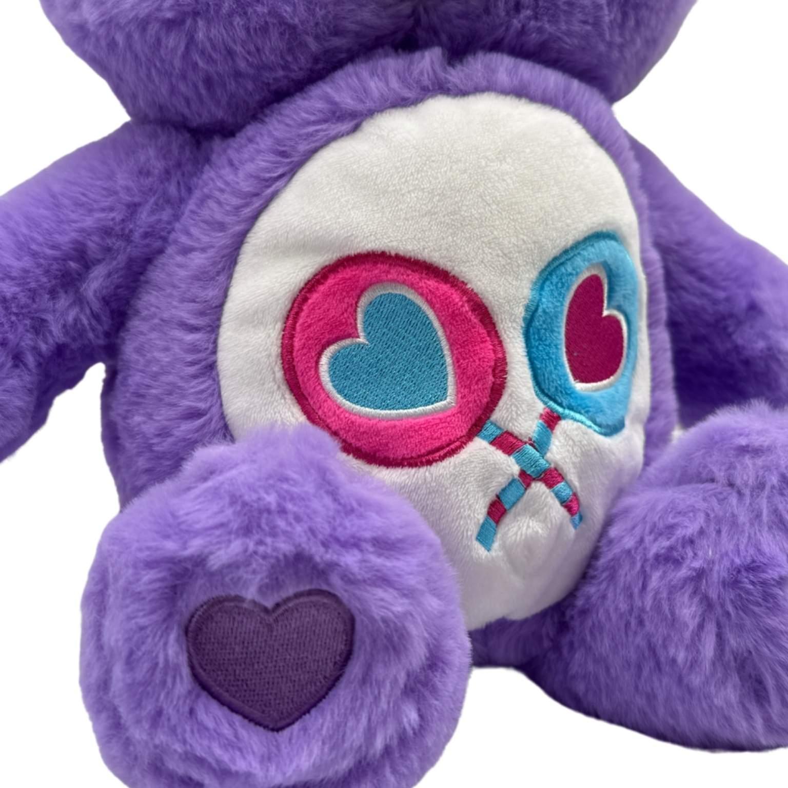 Detail van de buik van het Troetelbeertje – met het bekende Care Bears symbool voor eerlijkheid